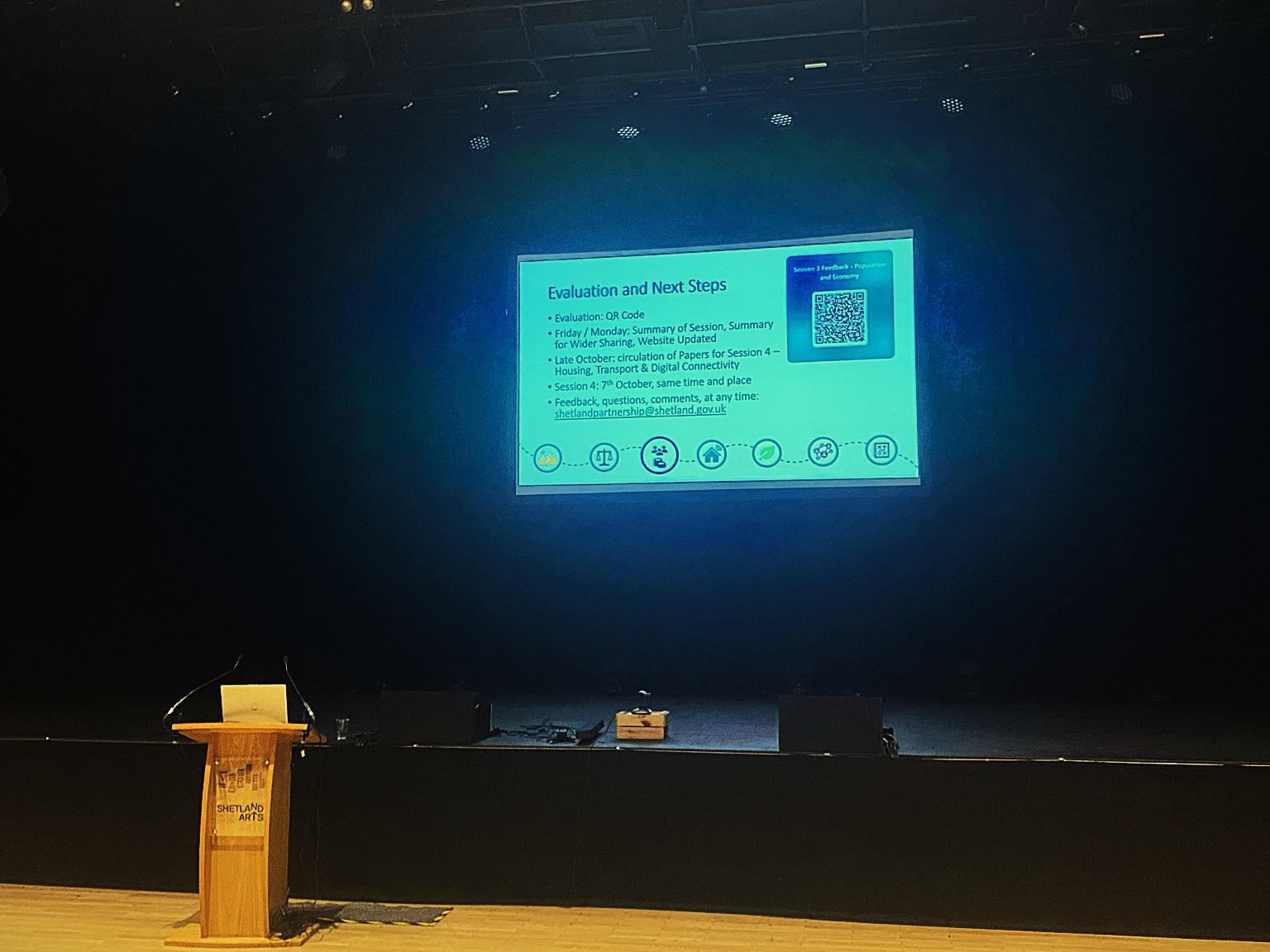 A presentation on stage at Mareel during Session 3 of the Shetland Partnership Plan development process
