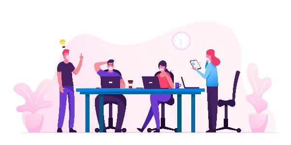 People sitting and standing around a desk in an office