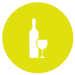 A Yellow circle with a white bottle and glass inside.