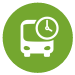 A green circle with the white outline of a bus and a clock inside.