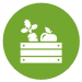 A green circle with a white outline of a veg box inside.